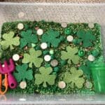 Set up an easy and inexpensive St. Patrick's Day sensory bin for your toddler and preschooler this March. They will engage in the sensory bin for hours.